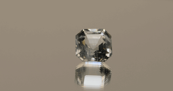 Natural octagon cut aquamarine gemstone with colorless hue, 9.95 × 9.89 mm