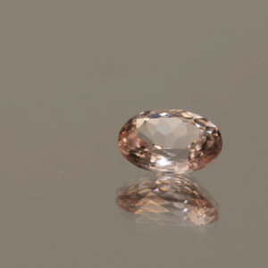 Pink sapphire gemstone, 1.01 carat, oval cut, unheated, loose gemstone, dimensions 7.04 × 5.51 × 3.01 mm, IGI certified.