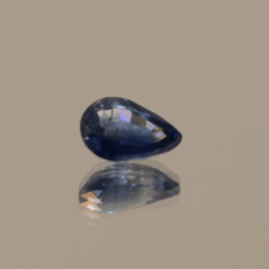 Blue pear-shaped sapphire, 0.83 carat, 6.88 × 4.83 × 3.04 mm, heat-treated, unknown origin, AIG certified.