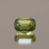 Natural 4.71 ct peridot in cushion cut, yellowish green color, untreated, loose gemstone, dimensions 11 × 8.4 × 6.3 mm, perfect for fine jewelry.