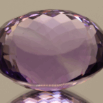 Natural oval cut amethyst gemstone with purple violet color, 22.10 × 16.00 mm