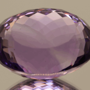 Natural oval cut amethyst gemstone with purple violet color, 22.10 × 16.00 mm