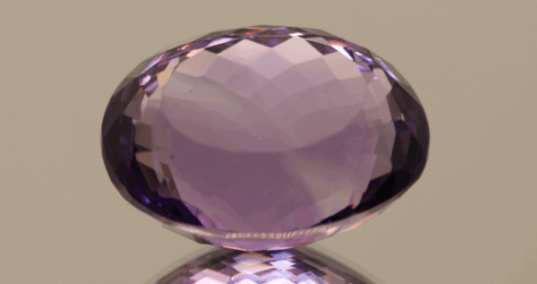 Natural oval cut amethyst gemstone with purple violet color, 22.10 × 16.00 mm