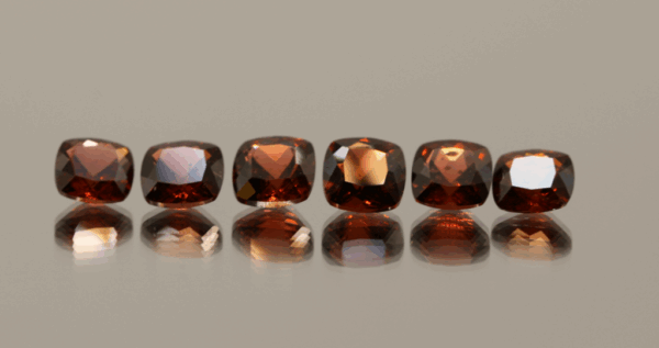 Natural spessartite garnet gemstones 6.8 carats cushion cut orange red color untreated loose stones set
