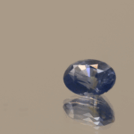 Pastel blue oval sapphire from Sri Lanka, heat-treated, 1.27 carat, 7.15 × 5.37 × 4.06 mm, Sri Lanka origin, AIG certified.