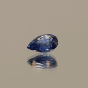 Blue pear-shaped sapphire, heat treated, unknown origin, 0.9 carat, dimensions 6.77 × 5.07 × 3.21 mm, AIG certified.