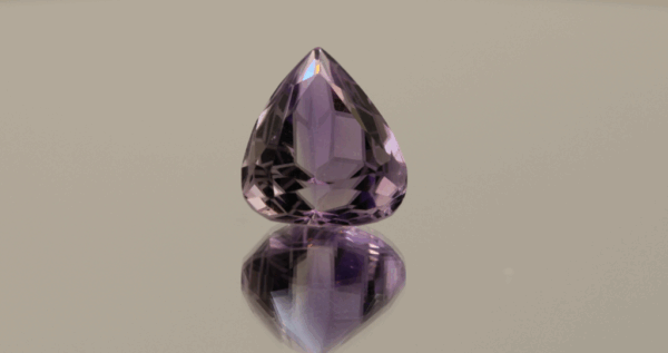 Natural pear cut amethyst gemstone with purple violet color, 15.61 × 12.95 mm