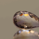 Natural pear cut ametrine gemstone with purple yellow color, 18.80 × 12.40 mm