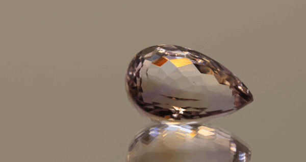 Natural pear cut ametrine gemstone with purple yellow color, 18.80 × 12.40 mm