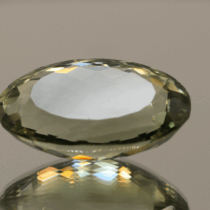 Natural prasiolite gemstone, 20.91 carat, oval cut, pale green color, untreated, loose gemstone, dimensions 23.6 × 14 × 9.2 mm, ideal for fine jewelry.