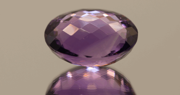 Natural oval cut amethyst gemstone with purple violet color, 22.10 × 17.10 mm