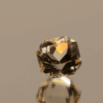 Light brown octagon-shaped topaz, 5.83 carat, 9.5 × 9.2 × 7.5 mm, no treatment, unknown origin.