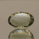 Natural prasiolite gemstone, 12.86 carat, oval cut, pale green color, untreated, loose gemstone, dimensions 17 × 13 × 9.2 mm, ideal for fine jewelry.