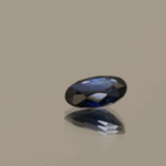Natural sapphire gemstone, 0.78 carat, oval cut, blue color, heat-treated, loose gemstone, dimensions 6.68 × 5.09 × 2.52 mm, origin unknown, IGS certified.
