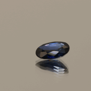 Natural sapphire gemstone, 0.78 carat, oval cut, blue color, heat-treated, loose gemstone, dimensions 6.68 × 5.09 × 2.52 mm, origin unknown, IGS certified.