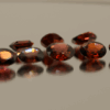 Natural almandine garnet gemstones 13.6 carats mixed cuts purple red color untreated loose stones set