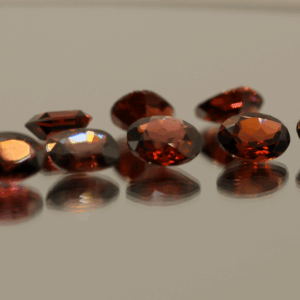 Natural almandine garnet gemstones 13.6 carats mixed cuts purple red color untreated loose stones set