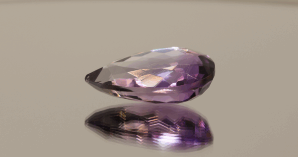 Natural pear cut amethyst gemstone with purple violet color, 22.20 × 15.30 mm