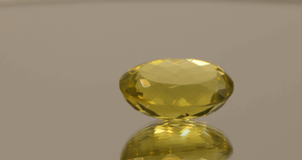 Lemon Quartz gemstone 13.48 carats, natural light yellow oval-cut, premium quality for jewelry