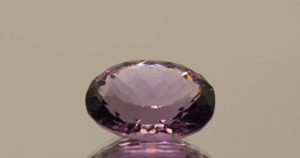 Natural oval cut amethyst gemstone with purple violet color, 15.10 × 10.60 mm