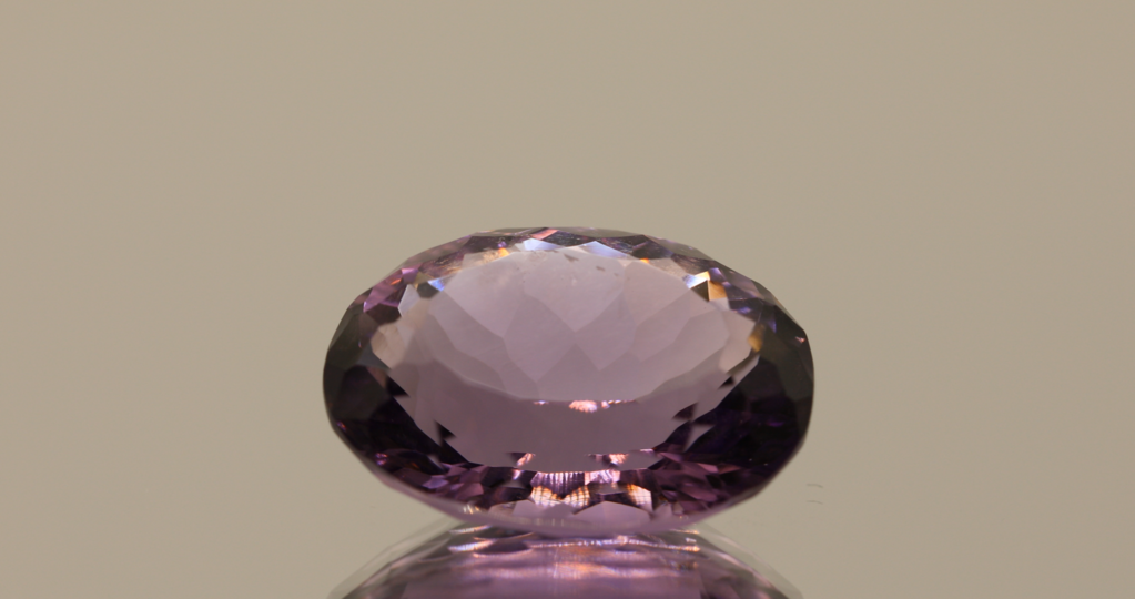 Natural amethyst, oval cut, purple-violet