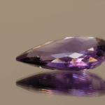 Natural pear cut amethyst gemstone with purple violet color, 24.80 × 15.80 mm