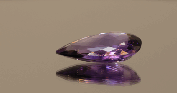 Natural pear cut amethyst gemstone with purple violet color, 24.80 × 15.80 mm