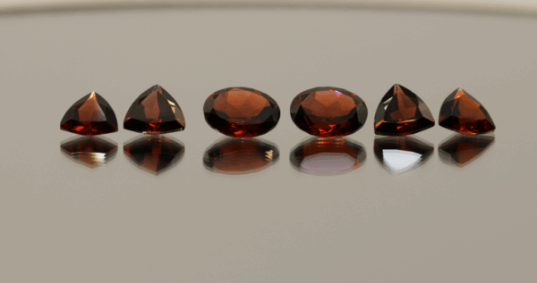 Natural almandine garnet gemstones 9 carats mixed cuts purple red color untreated loose stones set