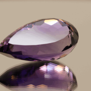 Natural pear cut amethyst gemstone with purple violet color, 24.70 × 14.50 mm