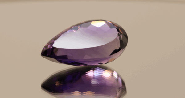 Natural pear cut amethyst gemstone with purple violet color, 24.70 × 14.50 mm