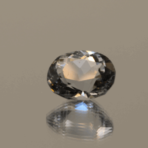 Natural oval cut aquamarine gemstone with colorless hue, 11.4 × 10.2 mm