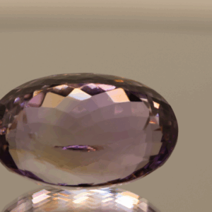 Natural oval cut amethyst gemstone with purple violet color, 21.30 × 14.00 mm