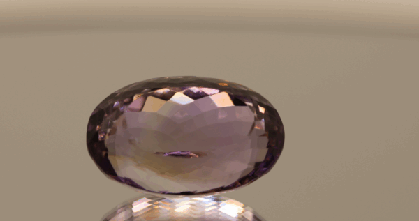 Natural oval cut amethyst gemstone with purple violet color, 21.30 × 14.00 mm