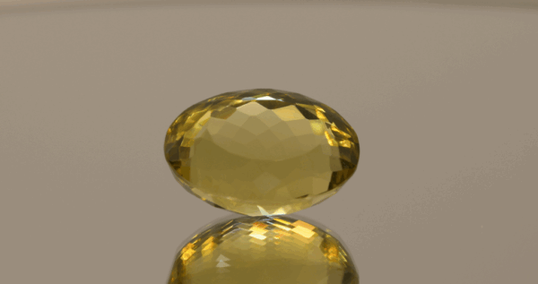 Lemon Quartz gemstone 14.1 carats, natural light yellow oval-cut, premium quality for jewelry