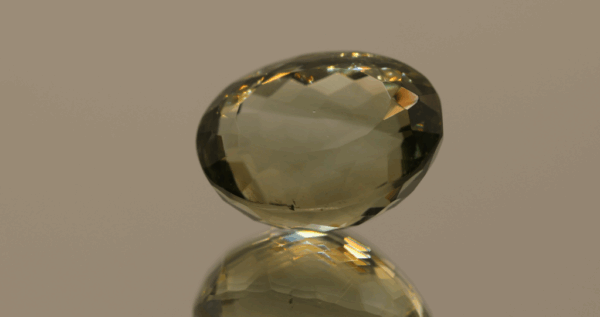 Natural prasiolite gemstone, 18.72 carat, oval cut, pale green color, untreated, loose gemstone, dimensions 18 × 14.3 × 11.2 mm, ideal for fine jewelry.
