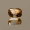 Light brown cushion-shaped topaz, 5.64 carat, 11.33 × 8.79 × 6.56 mm, no treatment, unknown origin.
