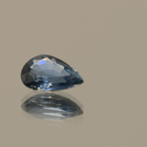 Blue pear-shaped sapphire, 0.77 carat, 7.16 × 4.86 × 2.70 mm, heat-treated, unknown origin, AIG certified.