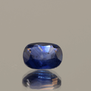 Natural Royal Blue color sapphire gemstone, 1.36 carat, cushion cut, royal blue color, heat treated, loose gemstone, dimensions 7.33 × 5.8 × 3.31 mm, origin Sri Lanka, AIG certified.