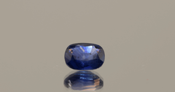 Natural Royal Blue color sapphire gemstone, 1.36 carat, cushion cut, royal blue color, heat treated, loose gemstone, dimensions 7.33 × 5.8 × 3.31 mm, origin Sri Lanka, AIG certified.