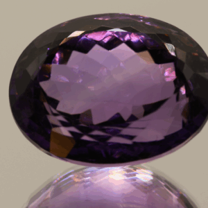 Natural oval cut amethyst gemstone with purple violet color, 22.10 × 16.80 mm