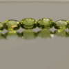 Natural peridot set, total weight 13.6 carat (12 stones), oval cut, yellowish green color, untreated, loose gemstones, dimensions 6.0–8.9 × 3.8–6.8 × 2.8–4.1 mm, ideal for fine jewelry.