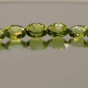 Natural peridot set, total weight 13.6 carat (12 stones), oval cut, yellowish green color, untreated, loose gemstones, dimensions 6.0–8.9 × 3.8–6.8 × 2.8–4.1 mm, ideal for fine jewelry.