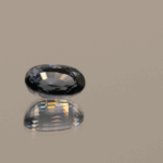 Blue oval-shaped GIA spinel, 1.57 carat, 8.32 × 5.28 × 4.14 mm, no treatment, unknown origin, GIA certified.