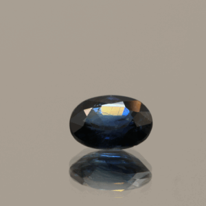 Royal blue color sapphire gemstone, 0.99 carat, oval cut, heat-treated, loose gemstone, dimensions 6.8 × 5.13 × 3.24 mm, origin Madagascar, IGS certified.