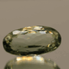 Natural prasiolite gemstone, 14.8 carat, oval cut, pale green color, untreated, loose gemstone, dimensions 21.2 × 11 × 9.6 mm, ideal for fine jewelry.
