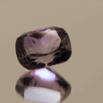 Natural cushion cut amethyst gemstone with purple violet color, 14.67 × 12.20 mm