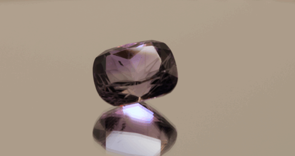 Natural cushion cut amethyst gemstone with purple violet color, 14.67 × 12.20 mm