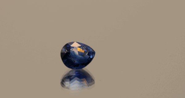 Blue pear-shaped sapphire, heat treated, unknown origin, 1.02 carat, dimensions 6.44 × 5.64 × 3.75 mm, AIG certified.