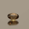 Padparadscha Sapphire. Brownish orange pink oval-shaped sapphire (Padparadscha), 1.58 carat, 7.73 × 5.80 × 3.90 mm, no treatment, Madagascar origin, GFCO certified.