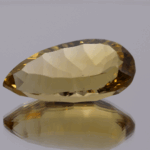 Natural pear cut citrine gemstone with yellow-orange color, 23.30 × 12.30 mm